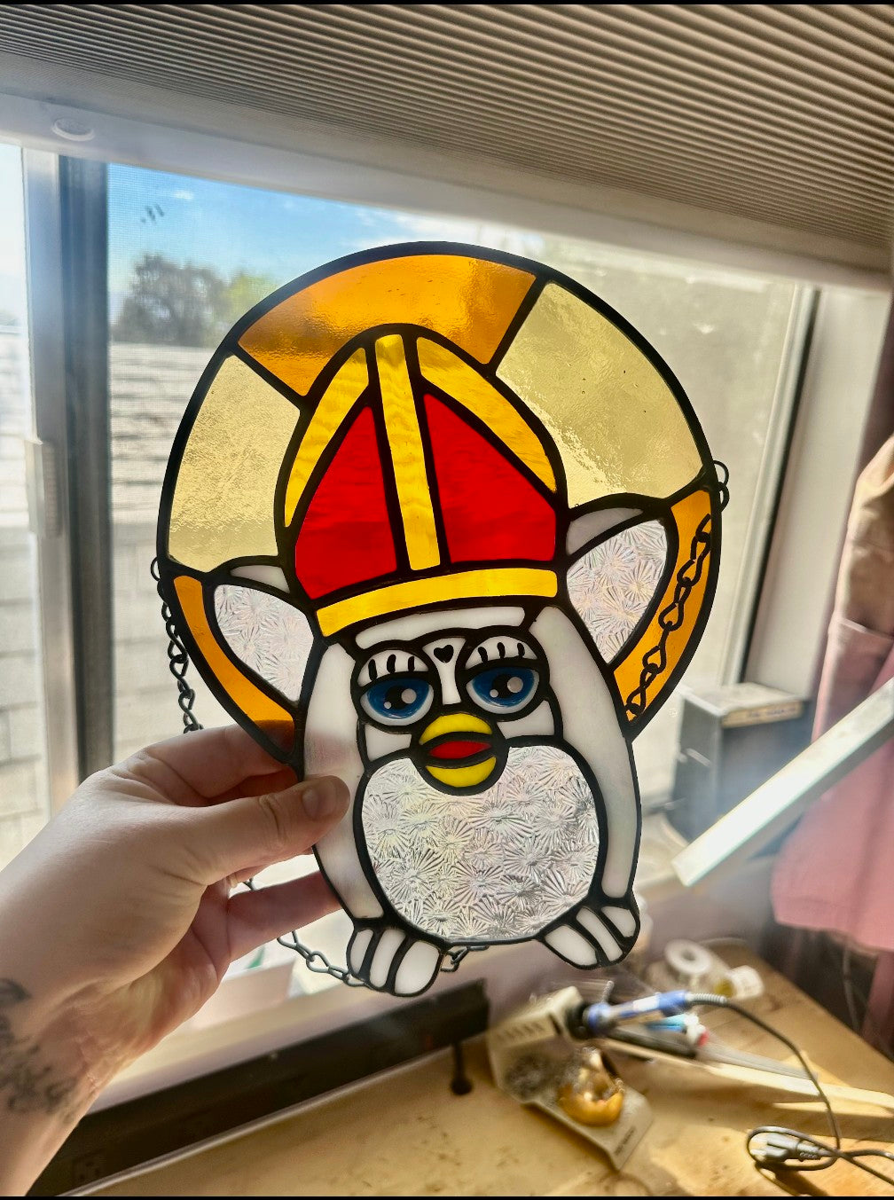 Brown Furby Pope Stained Glass
