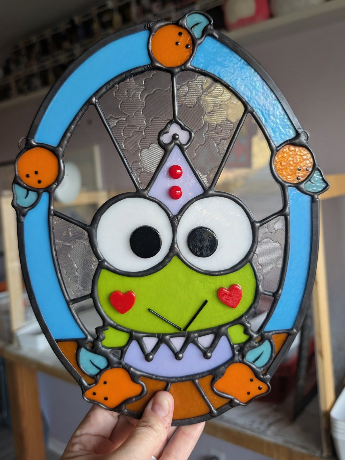 Juggling frog jester stained glass panel