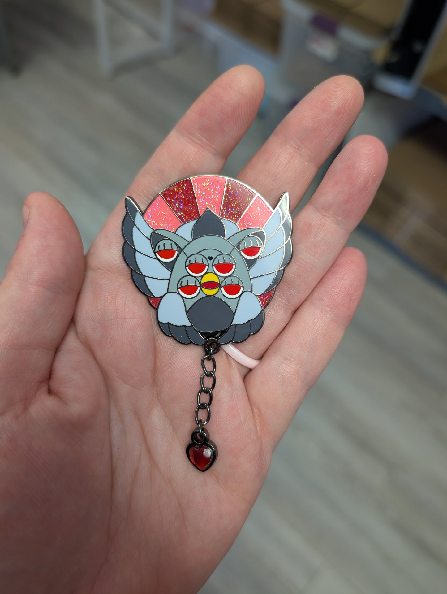 Red biblically accurate angel enamel pin