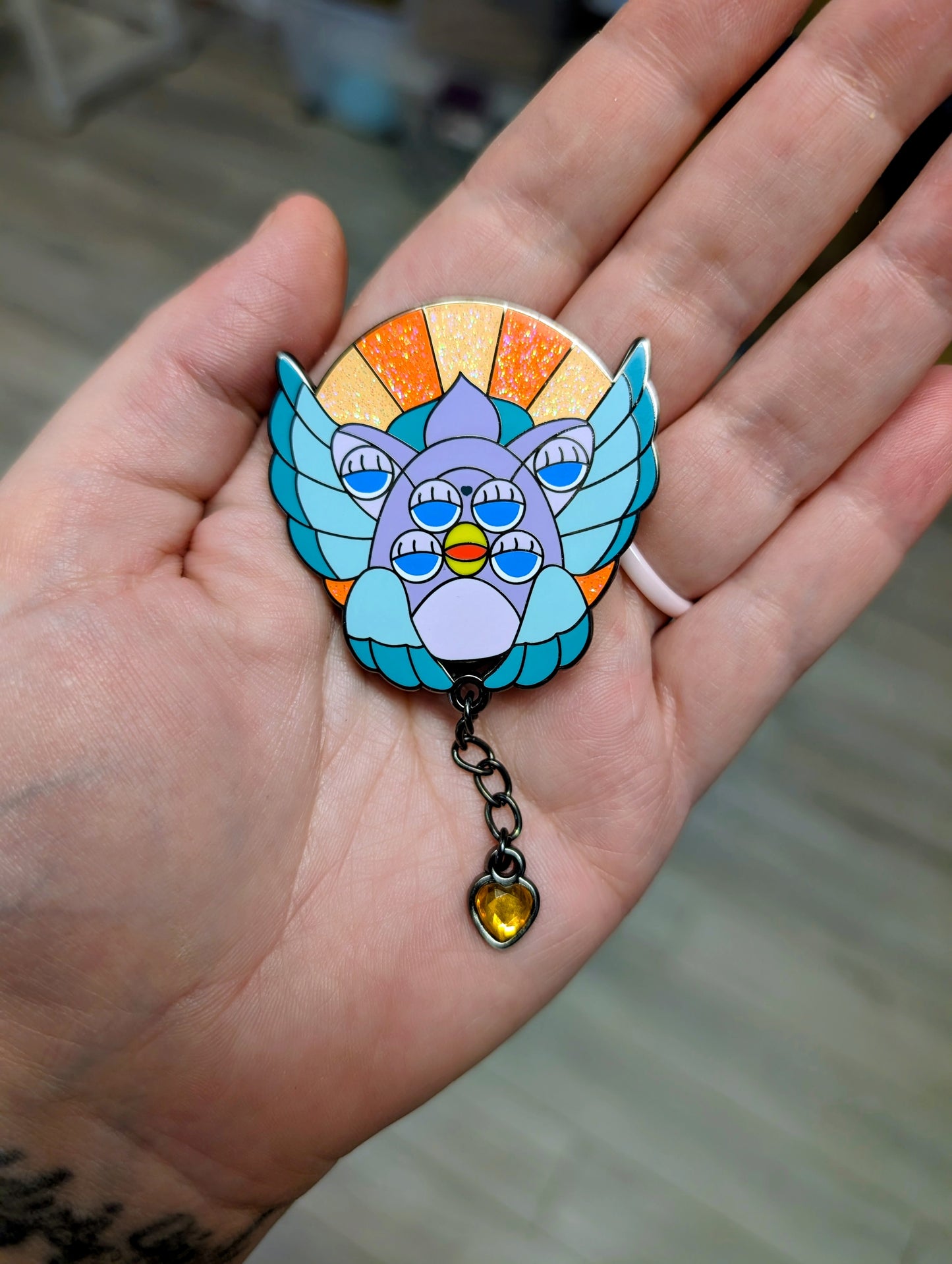 Orange & teal biblically accurate angel enamel pin
