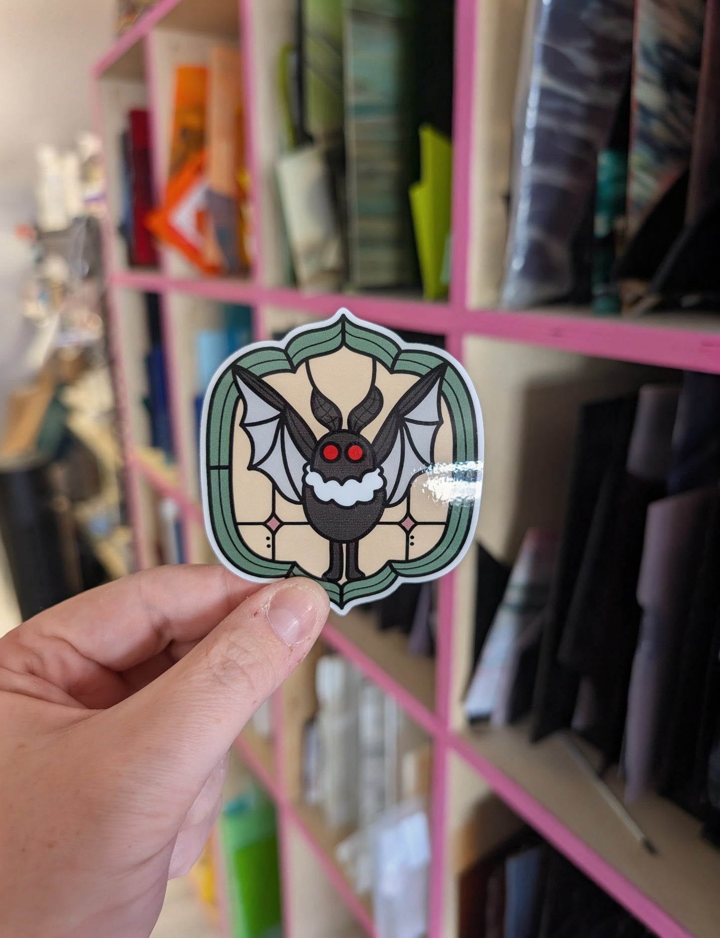 Stained Glass Moth Man Sticker
